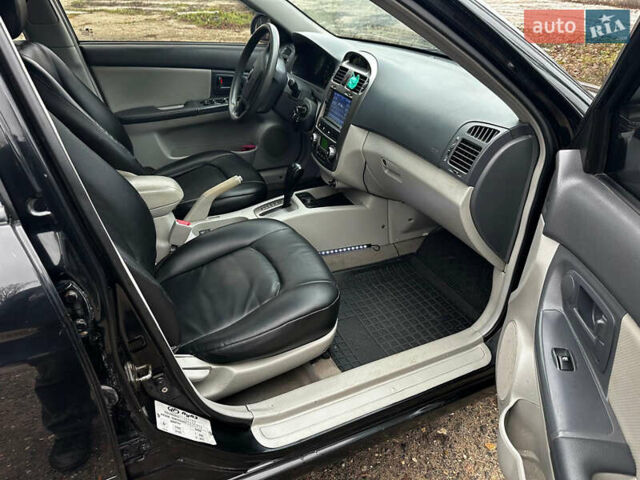 Чорний Кіа Черато, об'ємом двигуна 1.98 л та пробігом 240 тис. км за 5100 $, фото 10 на Automoto.ua