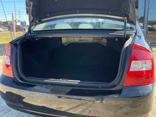 Черный Киа Черато, объемом двигателя 2 л и пробегом 268 тыс. км за 4200 $, фото 7 на Automoto.ua