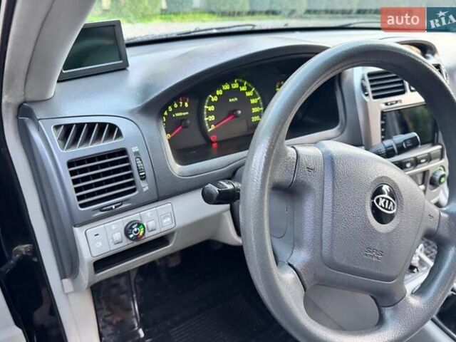 Черный Киа Черато, объемом двигателя 2 л и пробегом 318 тыс. км за 3900 $, фото 11 на Automoto.ua