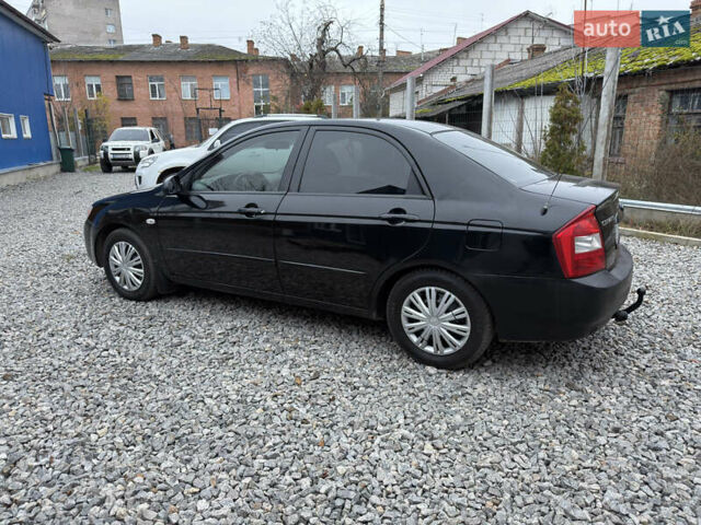 Черный Киа Черато, объемом двигателя 1.6 л и пробегом 220 тыс. км за 3300 $, фото 10 на Automoto.ua