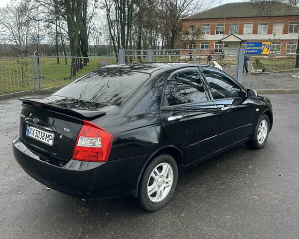 Черный Киа Черато, объемом двигателя 1.98 л и пробегом 236 тыс. км за 4100 $, фото 4 на Automoto.ua