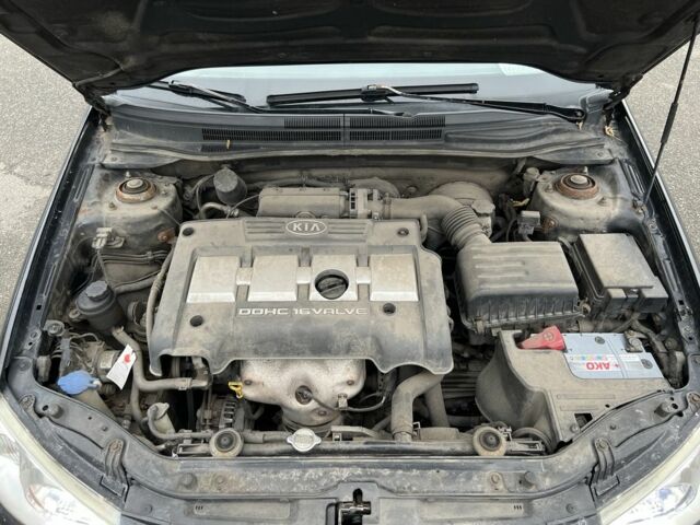 Черный Киа Черато, объемом двигателя 1.6 л и пробегом 230 тыс. км за 3200 $, фото 17 на Automoto.ua