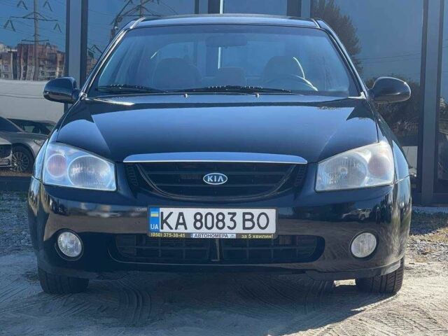 Черный Киа Черато, объемом двигателя 2 л и пробегом 268 тыс. км за 4200 $, фото 2 на Automoto.ua