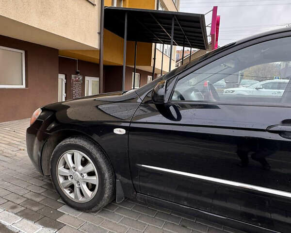 Черный Киа Черато, объемом двигателя 1.6 л и пробегом 232 тыс. км за 4300 $, фото 18 на Automoto.ua