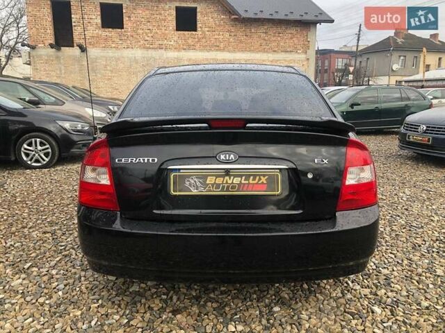 Чорний Кіа Черато, об'ємом двигуна 2 л та пробігом 177 тис. км за 4399 $, фото 6 на Automoto.ua