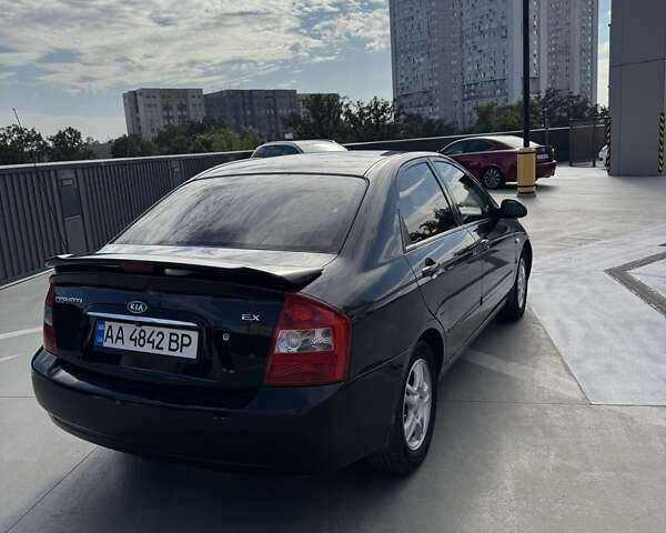 Черный Киа Черато, объемом двигателя 1.6 л и пробегом 250 тыс. км за 4100 $, фото 3 на Automoto.ua