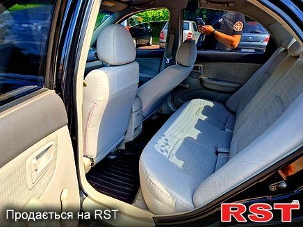 Черный Киа Черато, объемом двигателя 1.6 л и пробегом 300 тыс. км за 4000 $, фото 8 на Automoto.ua