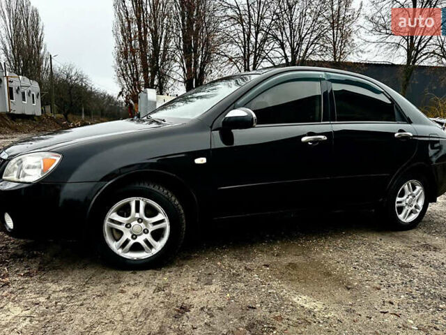 Чорний Кіа Черато, об'ємом двигуна 1.98 л та пробігом 240 тис. км за 5100 $, фото 1 на Automoto.ua