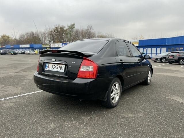 Черный Киа Черато, объемом двигателя 1.6 л и пробегом 230 тыс. км за 3200 $, фото 5 на Automoto.ua