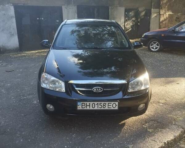 Черный Киа Черато, объемом двигателя 2 л и пробегом 220 тыс. км за 4900 $, фото 5 на Automoto.ua