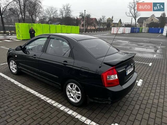 Черный Киа Черато, объемом двигателя 1.98 л и пробегом 190 тыс. км за 3850 $, фото 1 на Automoto.ua