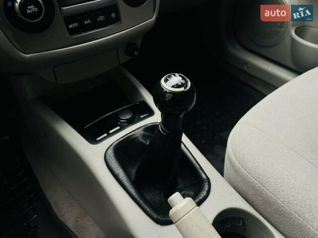 Чорний Кіа Черато, об'ємом двигуна 2 л та пробігом 319 тис. км за 4300 $, фото 22 на Automoto.ua