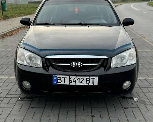 Чорний Кіа Черато, об'ємом двигуна 1.98 л та пробігом 177 тис. км за 3950 $, фото 9 на Automoto.ua