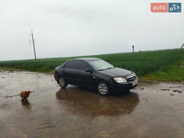 Черный Киа Черато, объемом двигателя 1.6 л и пробегом 300 тыс. км за 3900 $, фото 2 на Automoto.ua