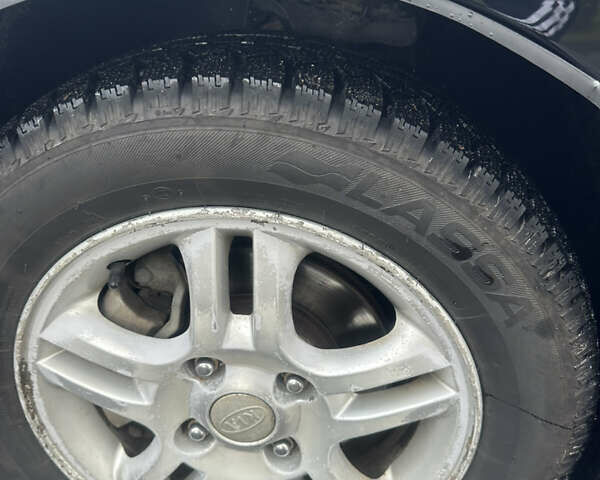 Черный Киа Черато, объемом двигателя 1.98 л и пробегом 236 тыс. км за 4100 $, фото 21 на Automoto.ua