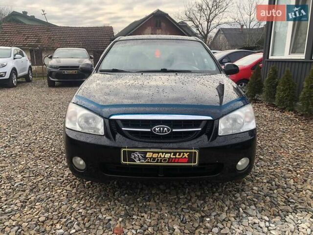 Чорний Кіа Черато, об'ємом двигуна 2 л та пробігом 177 тис. км за 4399 $, фото 1 на Automoto.ua
