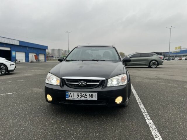 Черный Киа Черато, объемом двигателя 1.6 л и пробегом 230 тыс. км за 3200 $, фото 1 на Automoto.ua