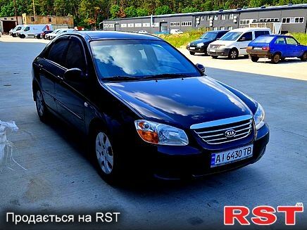 Черный Киа Черато, объемом двигателя 1.6 л и пробегом 300 тыс. км за 4000 $, фото 1 на Automoto.ua