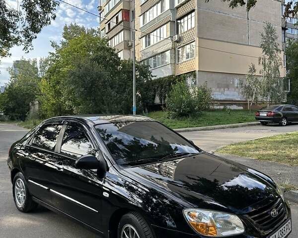 Черный Киа Черато, объемом двигателя 1.6 л и пробегом 181 тыс. км за 3900 $, фото 4 на Automoto.ua