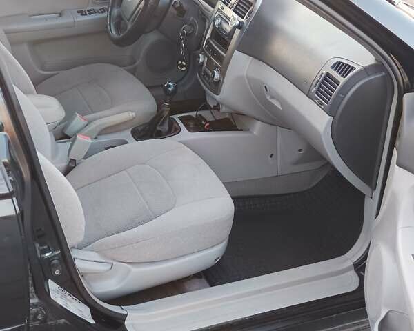 Черный Киа Черато, объемом двигателя 1.6 л и пробегом 230 тыс. км за 4250 $, фото 5 на Automoto.ua