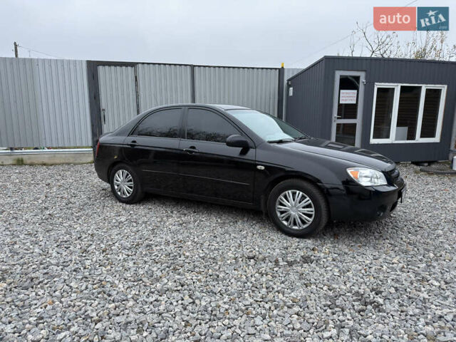 Черный Киа Черато, объемом двигателя 1.6 л и пробегом 220 тыс. км за 3300 $, фото 4 на Automoto.ua