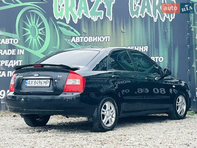 Чорний Кіа Черато, об'ємом двигуна 2 л та пробігом 319 тис. км за 4300 $, фото 5 на Automoto.ua