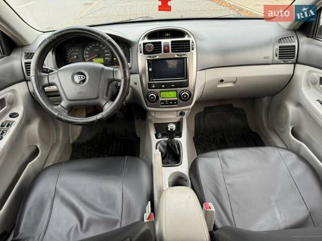 Чорний Кіа Черато, об'ємом двигуна 1.98 л та пробігом 177 тис. км за 3950 $, фото 1 на Automoto.ua