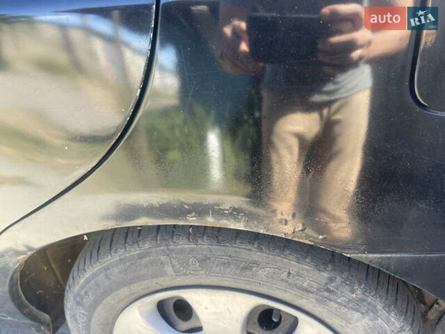 Чорний Кіа Черато, об'ємом двигуна 1.59 л та пробігом 202 тис. км за 2999 $, фото 7 на Automoto.ua