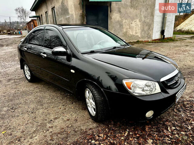 Чорний Кіа Черато, об'ємом двигуна 1.98 л та пробігом 240 тис. км за 5100 $, фото 2 на Automoto.ua