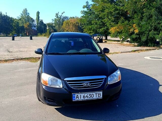 Чорний Кіа Черато, об'ємом двигуна 1.6 л та пробігом 367 тис. км за 3900 $, фото 1 на Automoto.ua