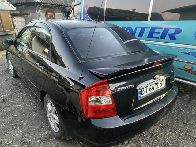 Черный Киа Черато, объемом двигателя 2 л и пробегом 240 тыс. км за 3300 $, фото 1 на Automoto.ua