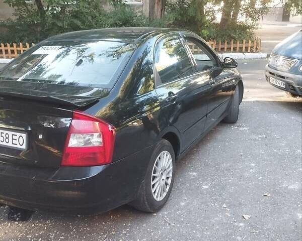 Черный Киа Черато, объемом двигателя 2 л и пробегом 220 тыс. км за 4900 $, фото 9 на Automoto.ua