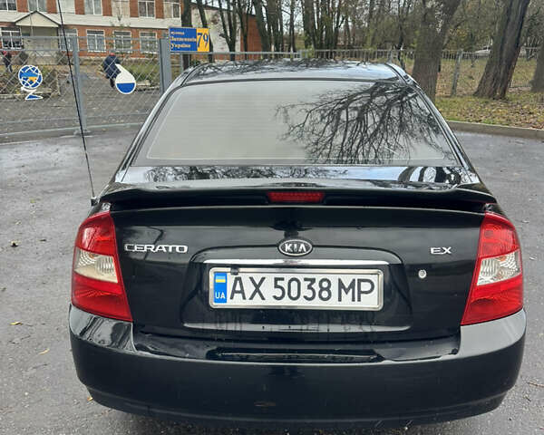Черный Киа Черато, объемом двигателя 1.98 л и пробегом 236 тыс. км за 4100 $, фото 5 на Automoto.ua