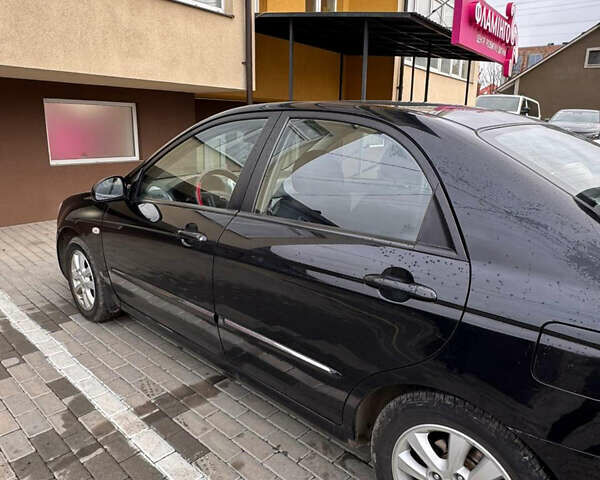 Черный Киа Черато, объемом двигателя 1.6 л и пробегом 232 тыс. км за 4300 $, фото 4 на Automoto.ua