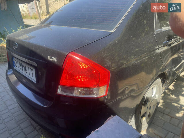 Чорний Кіа Черато, об'ємом двигуна 1.59 л та пробігом 202 тис. км за 2999 $, фото 3 на Automoto.ua