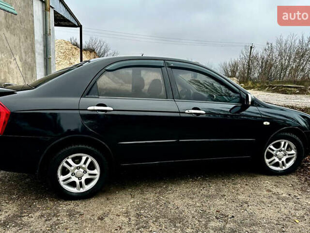 Чорний Кіа Черато, об'ємом двигуна 1.98 л та пробігом 240 тис. км за 5100 $, фото 3 на Automoto.ua