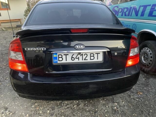 Черный Киа Черато, объемом двигателя 2 л и пробегом 240 тыс. км за 3300 $, фото 7 на Automoto.ua