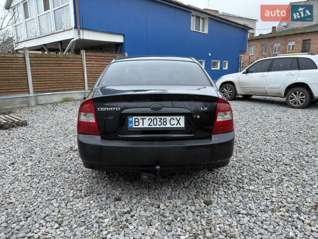 Черный Киа Черато, объемом двигателя 1.6 л и пробегом 220 тыс. км за 3300 $, фото 8 на Automoto.ua