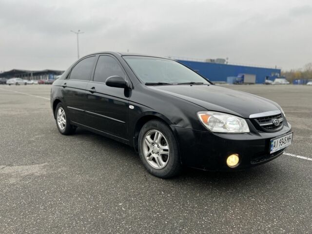 Черный Киа Черато, объемом двигателя 1.6 л и пробегом 230 тыс. км за 3200 $, фото 6 на Automoto.ua