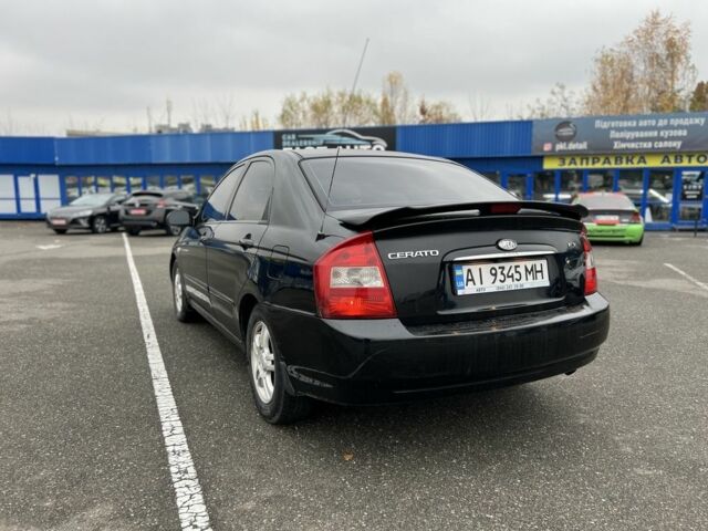 Черный Киа Черато, объемом двигателя 1.6 л и пробегом 230 тыс. км за 3200 $, фото 3 на Automoto.ua