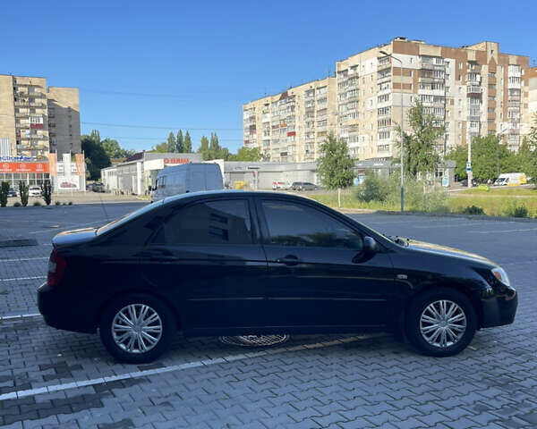 Черный Киа Черато, объемом двигателя 1.6 л и пробегом 230 тыс. км за 3600 $, фото 10 на Automoto.ua