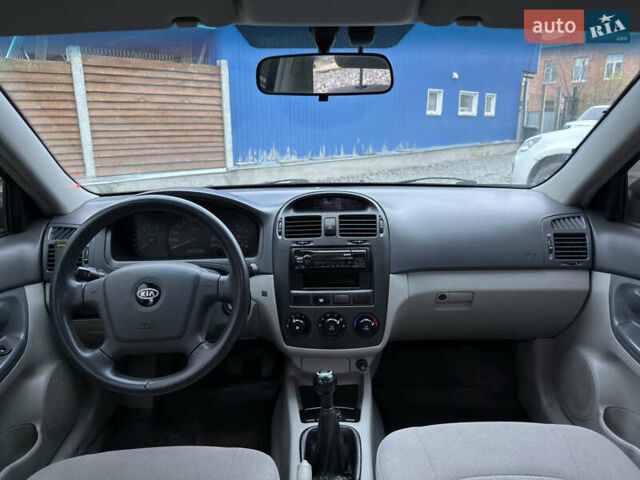 Черный Киа Черато, объемом двигателя 1.6 л и пробегом 220 тыс. км за 3300 $, фото 14 на Automoto.ua