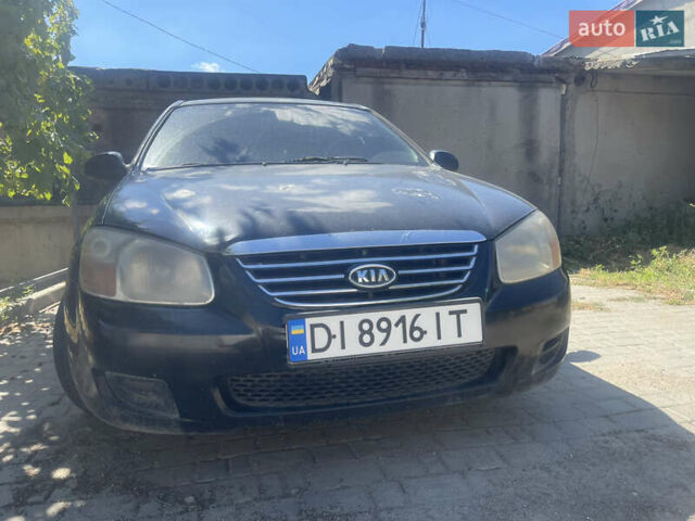 Чорний Кіа Черато, об'ємом двигуна 1.59 л та пробігом 202 тис. км за 2999 $, фото 9 на Automoto.ua