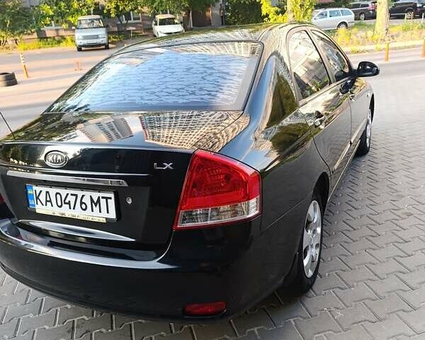 Чорний Кіа Черато, об'ємом двигуна 1.6 л та пробігом 237 тис. км за 5300 $, фото 5 на Automoto.ua