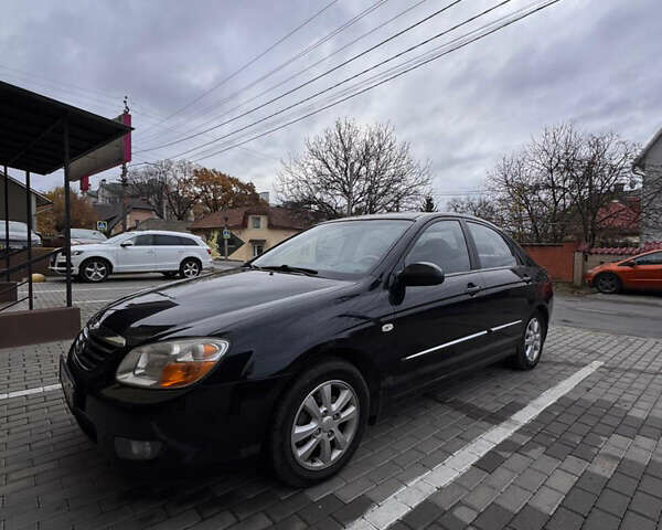 Черный Киа Черато, объемом двигателя 1.6 л и пробегом 232 тыс. км за 4300 $, фото 1 на Automoto.ua