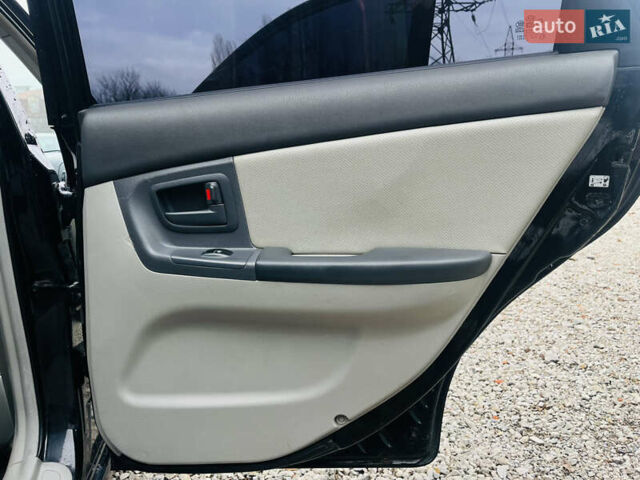 Чорний Кіа Черато, об'ємом двигуна 2 л та пробігом 319 тис. км за 4300 $, фото 17 на Automoto.ua