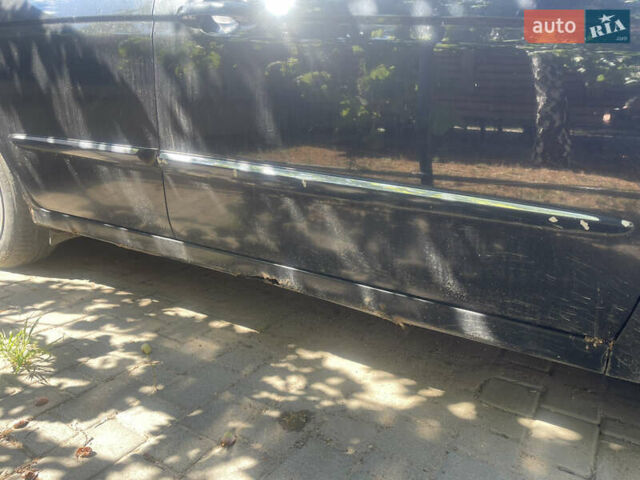 Чорний Кіа Черато, об'ємом двигуна 1.59 л та пробігом 202 тис. км за 2999 $, фото 8 на Automoto.ua