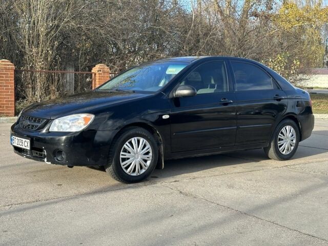 Черный Киа Черато, объемом двигателя 1.6 л и пробегом 245 тыс. км за 2850 $, фото 4 на Automoto.ua