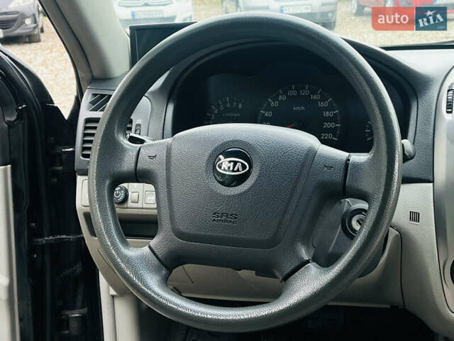 Чорний Кіа Черато, об'ємом двигуна 2 л та пробігом 319 тис. км за 4300 $, фото 14 на Automoto.ua