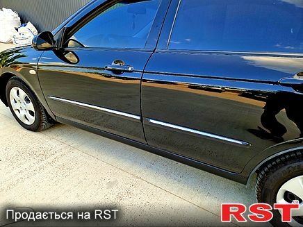 Черный Киа Черато, объемом двигателя 1.6 л и пробегом 300 тыс. км за 4000 $, фото 7 на Automoto.ua